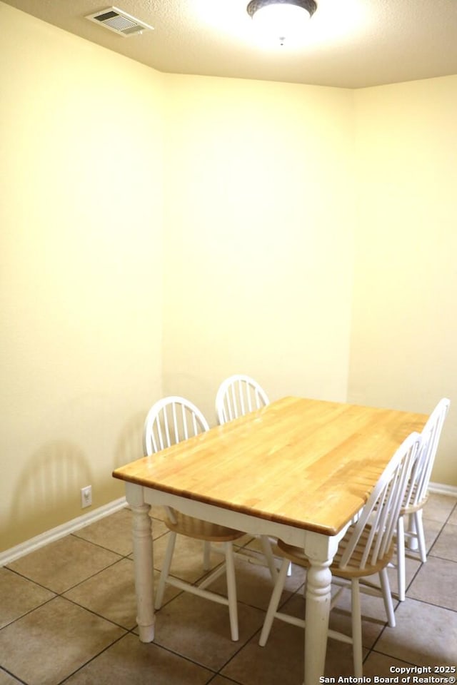 9522 Sage Ter, San Antonio, TX 78251 - dining space with light tile patterned floors