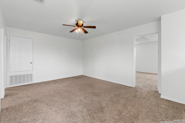 221 Passerina Spur, Schertz, TX 78154 - spare room featuring carpet and ceiling fan