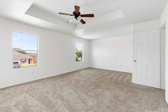221 Passerina Spur, Schertz, TX 78154 - unfurnished room with a raised ceiling, carpet flooring, and ceiling fan
