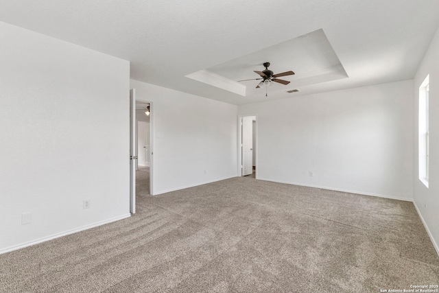 221 Passerina Spur, Schertz, TX 78154 - carpeted empty room featuring a tray ceiling and a ceiling fan