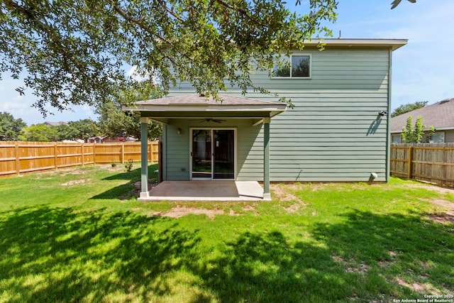 221 Passerina Spur, Schertz, TX 78154 - back of property with ceiling fan, a fenced backyard, and a patio