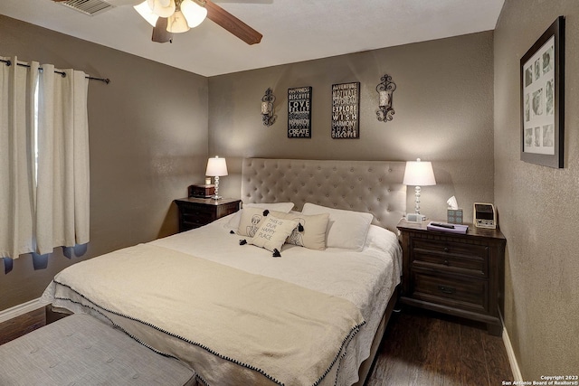 402 Hermine Blvd, San Antonio, TX 78212 - bedroom featuring wood finished floors, a textured wall, and ceiling fan