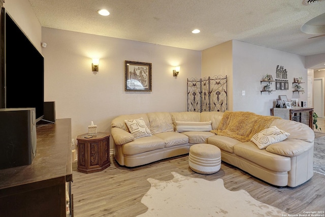 402 Hermine Blvd, San Antonio, TX 78212 - living room with light wood-style flooring, a textured ceiling, ceiling fan, and recessed lighting