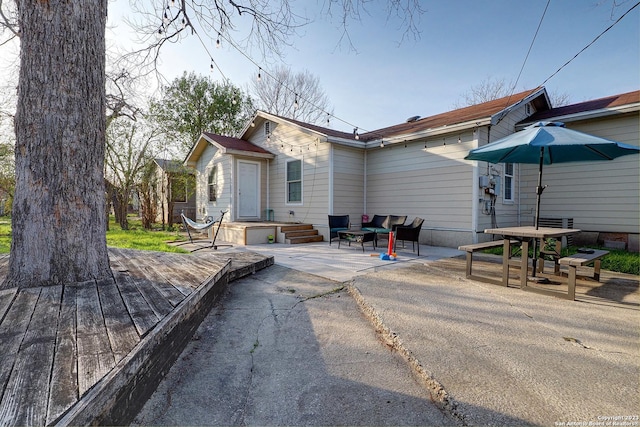402 Hermine Blvd, San Antonio, TX 78212 - rear view of house with a wooden deck and a patio
