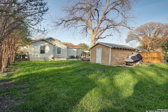 402 Hermine Blvd, San Antonio, TX 78212 - fenced backyard featuring a storage shed