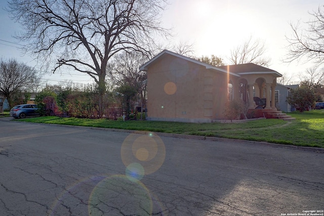 402 Hermine Blvd, San Antonio, TX 78212 - view of property exterior with a lawn