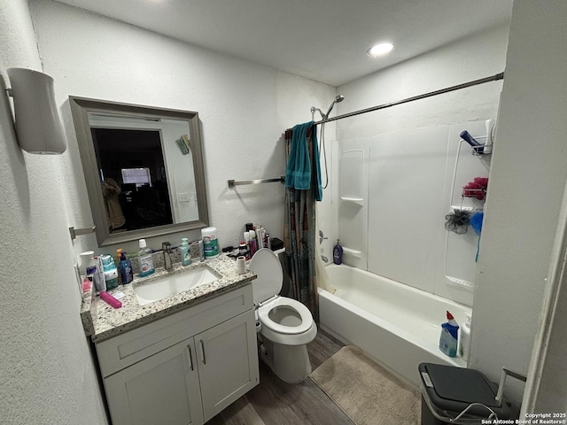 3527 S Laredo, San Antonio, TX 78207 - full bathroom with wood finished floors, vanity, shower / bath combo, and recessed lighting