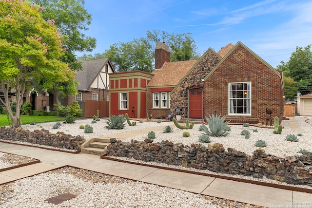 138 E Lullwood Ave, San Antonio, TX 78212 - english style home with a chimney and brick siding