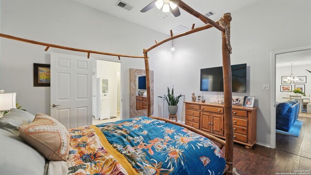 1739 Oak Gln, New Braunfels, TX 78132 - bedroom with wood finished floors, a chandelier, and ceiling fan