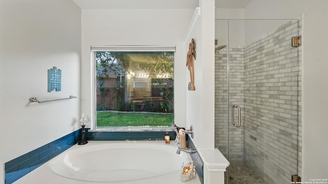 1739 Oak Gln, New Braunfels, TX 78132 - full bathroom featuring a bath and a stall shower