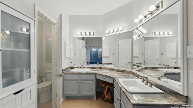 1739 Oak Gln, New Braunfels, TX 78132 - full bathroom featuring double vanity and tile patterned flooring