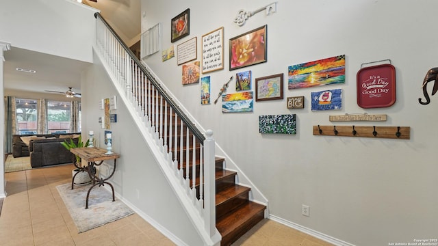 1739 Oak Gln, New Braunfels, TX 78132 - stairway featuring ceiling fan and tile patterned flooring