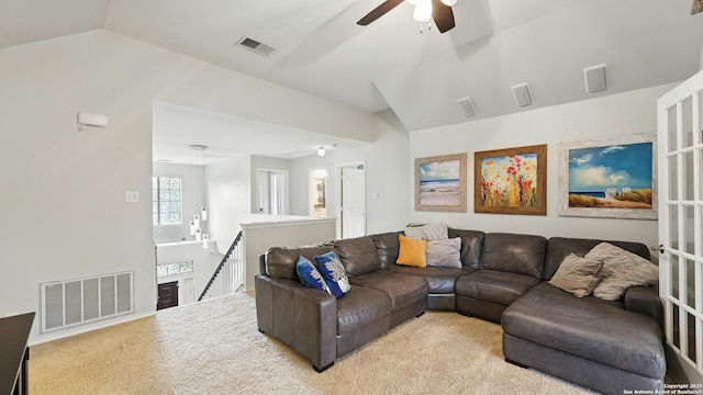 1739 Oak Gln, New Braunfels, TX 78132 - living area with vaulted ceiling, ceiling fan, and carpet flooring