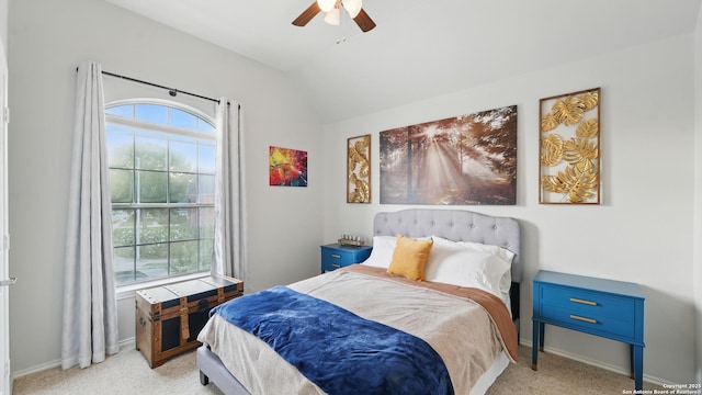 1739 Oak Gln, New Braunfels, TX 78132 - bedroom featuring lofted ceiling, multiple windows, light carpet, and a ceiling fan
