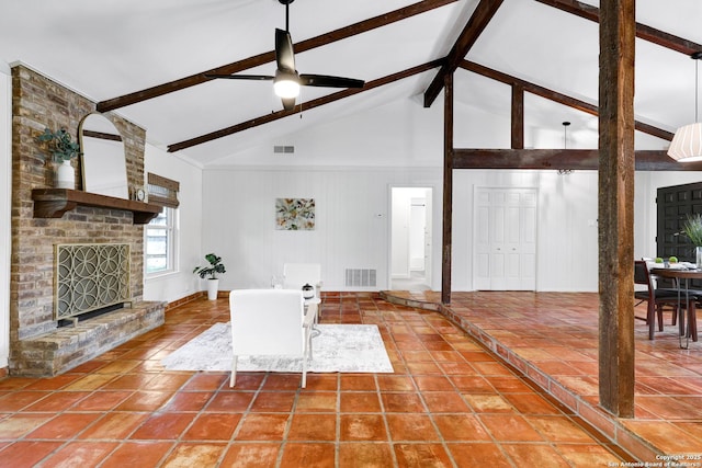 2116 Turkey Ledge, San Antonio, TX 78232 - living room featuring beam ceiling, ceiling fan, a brick fireplace, tile patterned flooring, and high vaulted ceiling