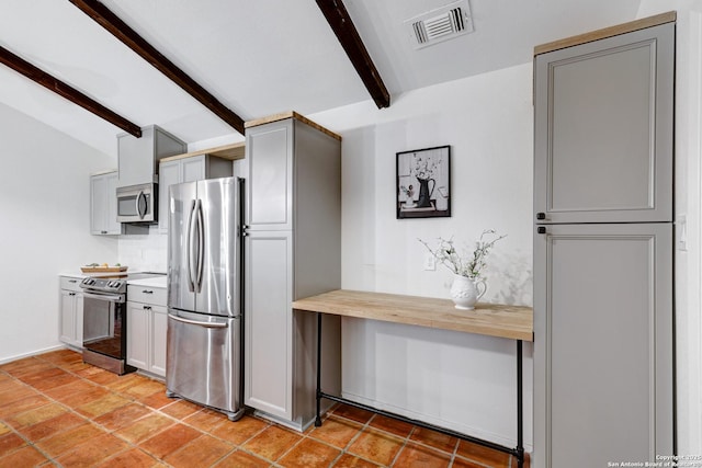 2116 Turkey Ledge, San Antonio, TX 78232 - kitchen featuring stainless steel appliances, gray cabinets, and light tile patterned flooring