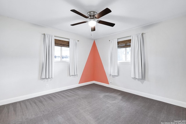 2116 Turkey Ledge, San Antonio, TX 78232 - empty room featuring healthy amount of natural light, a ceiling fan, and dark carpet