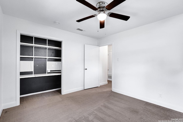2116 Turkey Ledge, San Antonio, TX 78232 - unfurnished bedroom featuring carpet flooring, a ceiling fan, and a closet