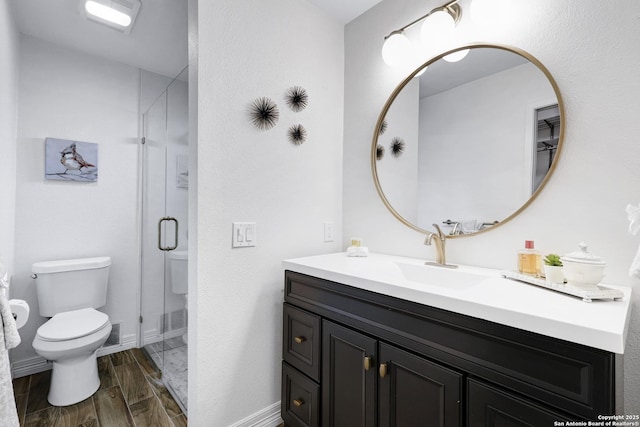 2116 Turkey Ledge, San Antonio, TX 78232 - full bathroom with vanity, a stall shower, and wood finish floors