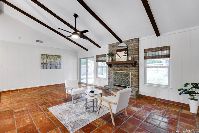 2116 Turkey Ledge, San Antonio, TX 78232 - tiled living area with a ceiling fan and a fireplace