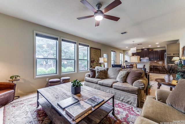108 Brown Hawk, Boerne, TX 78006 - living area featuring a ceiling fan and recessed lighting
