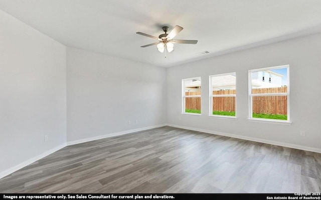 11619 Cowper Horn, San Antonio, TX 78245 - spare room featuring plenty of natural light, a ceiling fan, and wood finished floors