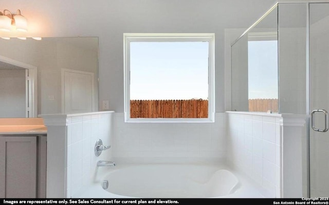 11619 Cowper Horn, San Antonio, TX 78245 - bathroom with vanity, a bath, and a shower stall