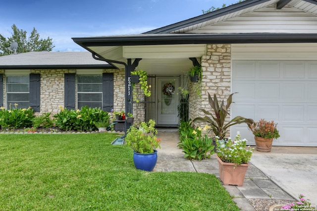 8211 Littleport, San Antonio, TX 78239 - doorway to property with stone siding, a yard, and an attached garage