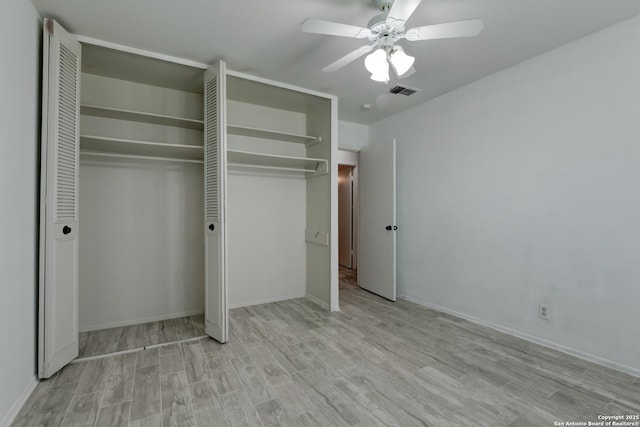8211 Littleport, San Antonio, TX 78239 - unfurnished bedroom featuring wood finished floors and a ceiling fan