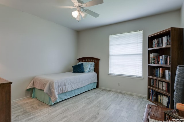 8211 Littleport, San Antonio, TX 78239 - bedroom featuring wood finished floors and ceiling fan