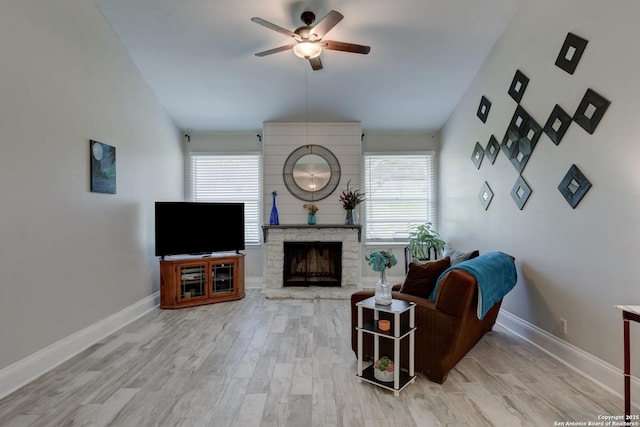 8211 Littleport, San Antonio, TX 78239 - living area featuring ceiling fan, wood finished floors, a fireplace, and lofted ceiling