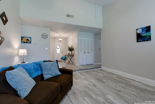8211 Littleport, San Antonio, TX 78239 - living area with wood finished floors and a towering ceiling