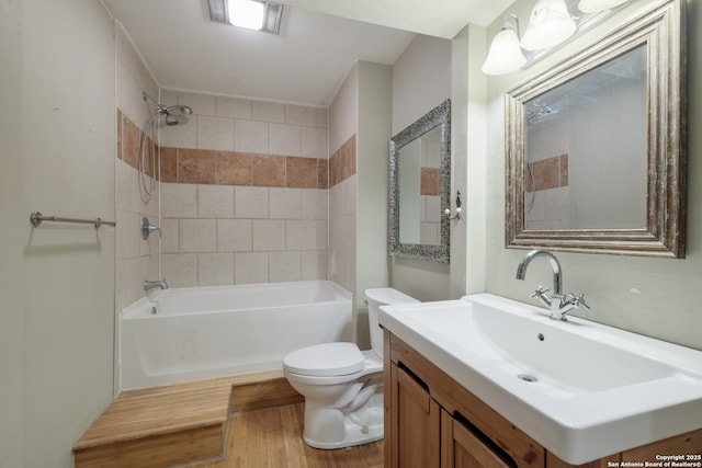 6914 Glen Gate, San Antonio, TX 78239 - bathroom with wood finished floors, vanity, and shower / tub combination