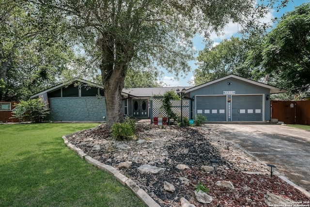 6914 Glen Gate, San Antonio, TX 78239 - view of front of home featuring driveway, a front lawn, and a garage