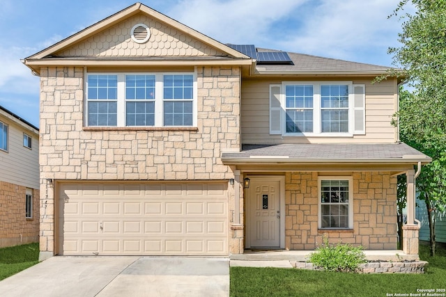 11747 Silver Pr, San Antonio, TX 78254 - view of front facade featuring stone siding, a garage, solar panels, and driveway