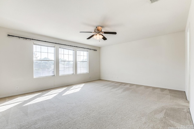 11747 Silver Pr, San Antonio, TX 78254 - empty room with light carpet and a ceiling fan