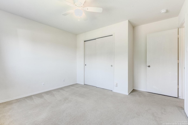 11747 Silver Pr, San Antonio, TX 78254 - unfurnished bedroom featuring light colored carpet, a closet, and ceiling fan