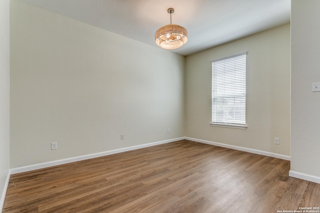 27338 Wrought Iron, San Antonio, TX 78260 - unfurnished room with wood finished floors and baseboards