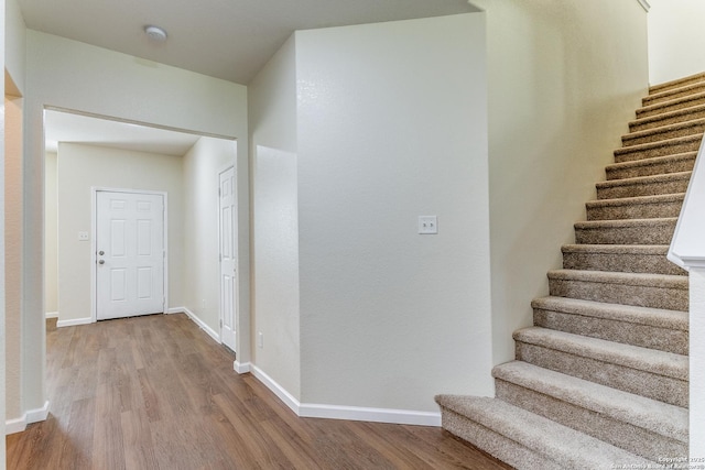 27338 Wrought Iron, San Antonio, TX 78260 - stairway featuring wood finished floors