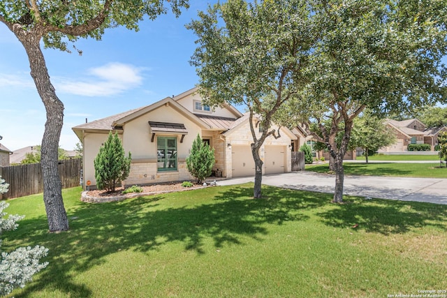 130 Boulder Crk, Boerne, TX 78006 - view of front of home with stucco siding, driveway, stone siding, and an attached garage