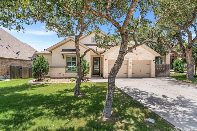 130 Boulder Crk, Boerne, TX 78006 - view of front facade with stone siding, stucco siding, driveway, and a garage
