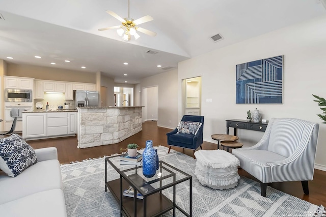 1407 Canyon Edge, San Antonio, TX 78248 - living room with dark wood finished floors, a ceiling fan, vaulted ceiling, and recessed lighting