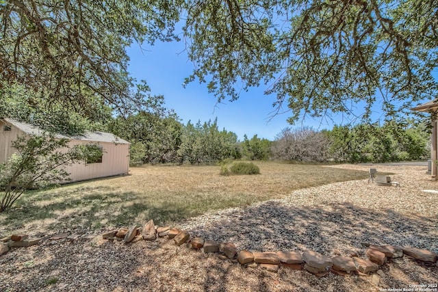 1463 Birch Ln, Fischer, TX 78623 - view of yard featuring an outbuilding