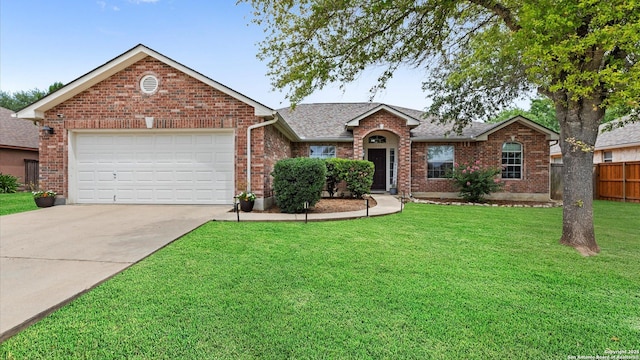 1238 Sugar Land, New Braunfels, TX 78130 - view of front facade featuring driveway, an attached garage, brick siding, and a shingled roof