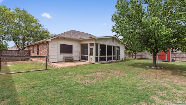 1238 Sugar Land, New Braunfels, TX 78130 - rear view of property featuring a fenced backyard, a sunroom, a storage unit, a patio, and brick siding