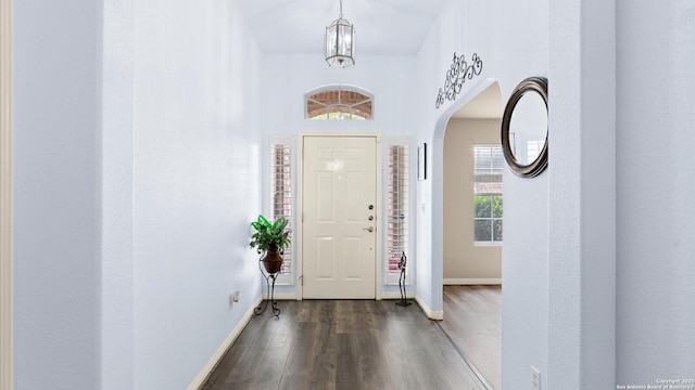 1238 Sugar Land, New Braunfels, TX 78130 - foyer with dark wood-type flooring and arched walkways