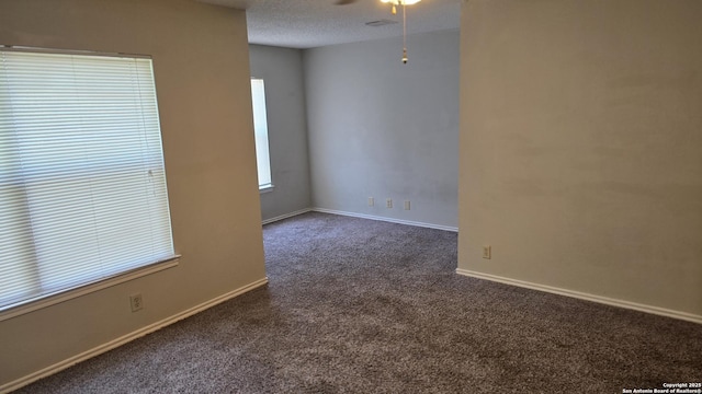 8310 Border Rdg, San Antonio, TX 78240 - empty room with dark carpet and a ceiling fan
