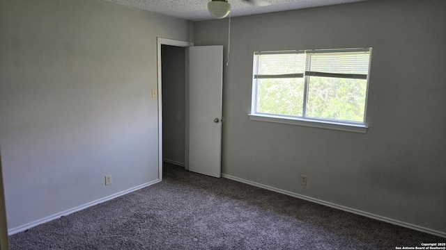 8310 Border Rdg, San Antonio, TX 78240 - carpeted empty room with ceiling fan and a textured ceiling