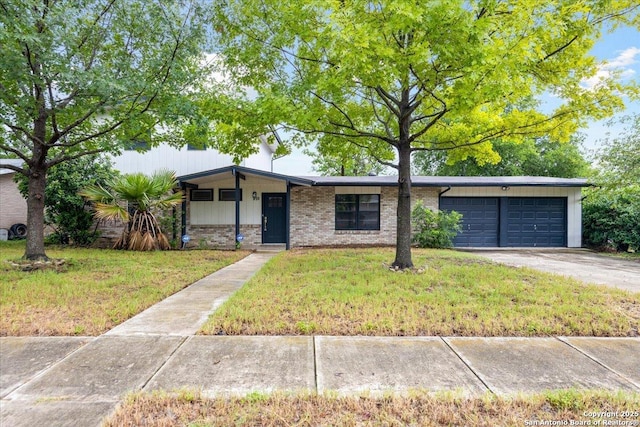910 Mount Kisco, San Antonio, TX 78213 - view of front facade with a garage, a front lawn, driveway, and brick siding