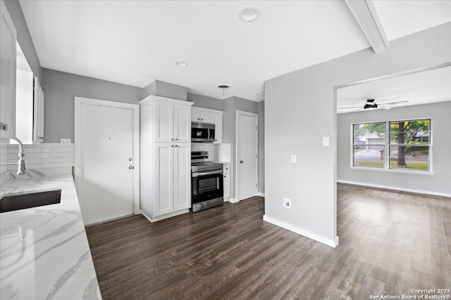 910 Mount Kisco, San Antonio, TX 78213 - kitchen with stainless steel appliances, decorative backsplash, light stone counters, dark wood-type flooring, and white cabinetry